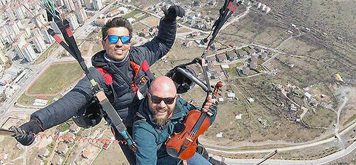 MANIC MONDAY | Violinist Performs 5,000ft Above Ground - image attachment