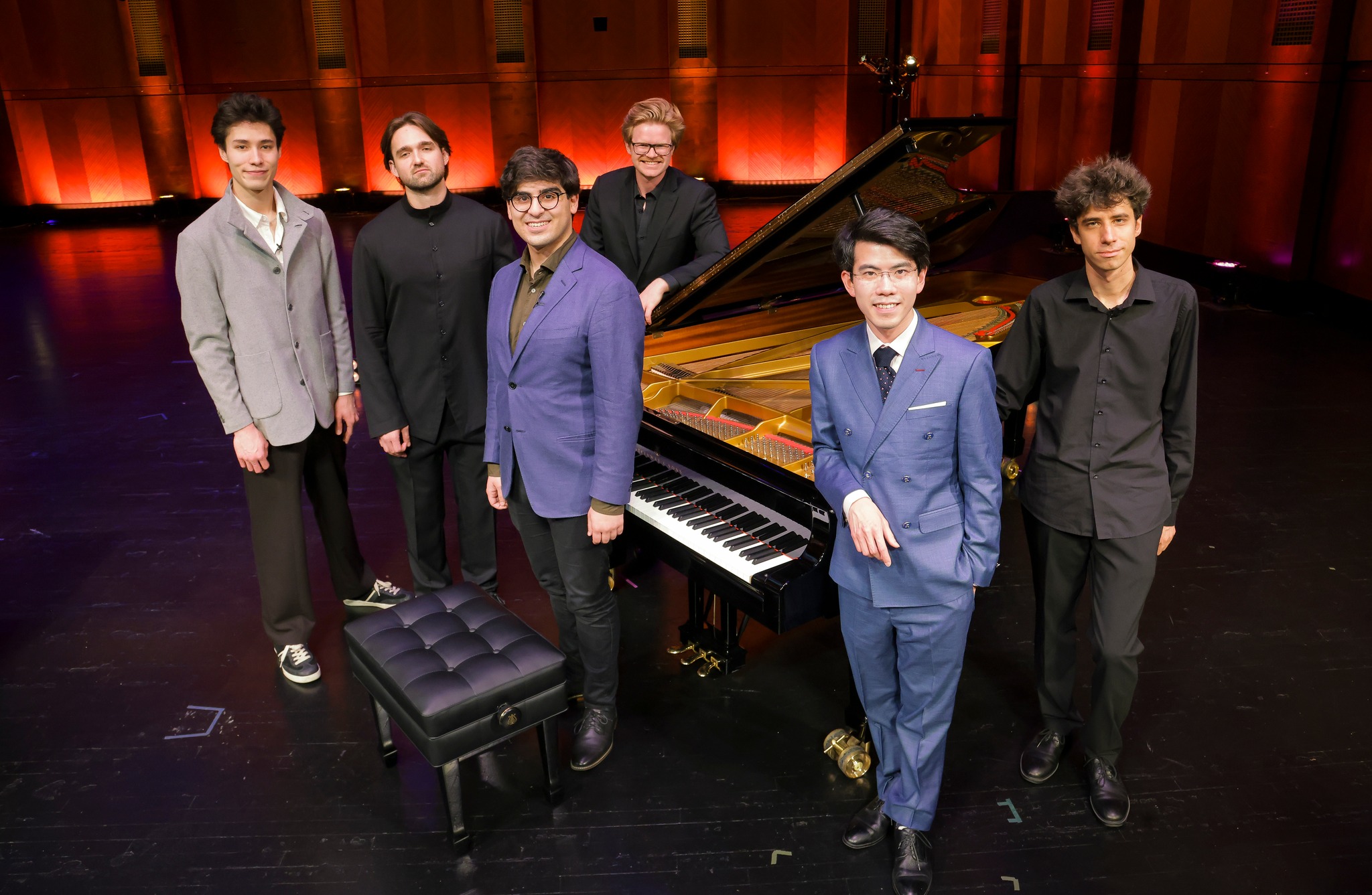 June 1, 2025. The Finalists in the Seventeenth Van Cliburn International Piano Competition were announced. They are (from left), Angel Stanislav Wang, 22, of the United States, Philipp Lynov, 26, of Russia, Evren Ozel, 26, of the United States, Carter Johnson, 28, of Canada/ United States, Aristo Sham, 29, of Hong Kong, China, and Vitaly Skarikov,, 29, of ISrael/Russia Bass Hall in Fort Worth, Texas USA. (Photo by Ralph Lauer)